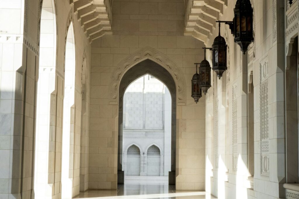 Mosque arcade with hanging lanterns